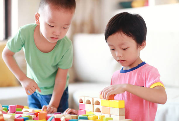 istock Cute asian Children playing with blocks 823244730