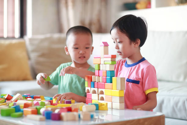 istock Cute asian Children playing with blocks 823244984