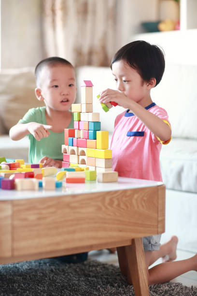 istock Cute asian Children playing with blocks 823245004