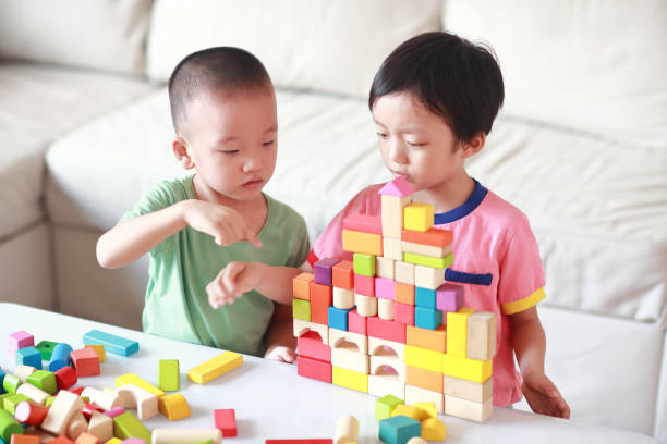 istock Cute asian Children playing with blocks 823245120