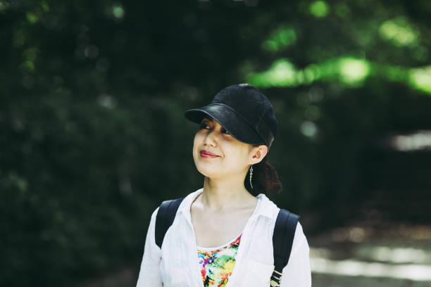 istock Japanese woman walking in nature 823255084