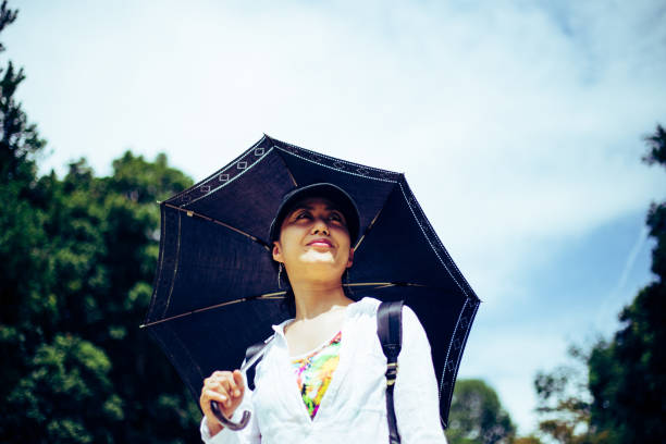 istock Japanese woman walking in nature 823255256