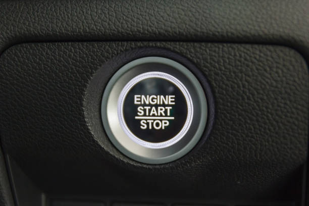 istock Close up of Start/stop engine button in modern vehicle, Car interior. 823256054