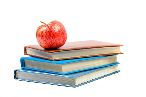 istock Heap of books with apple 823257108