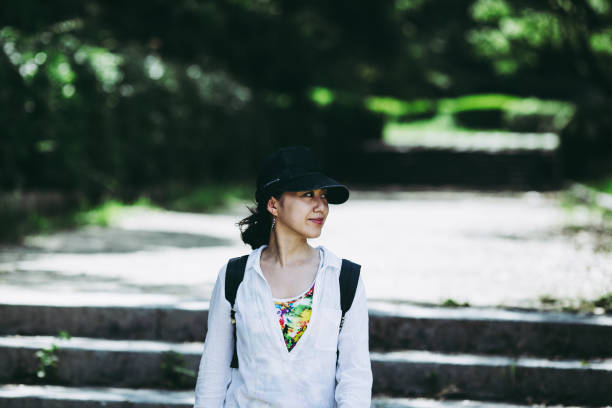 istock Japanese woman walking in nature 823259532