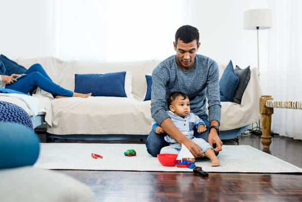 istock Young ethnic family with baby having fun 823267582