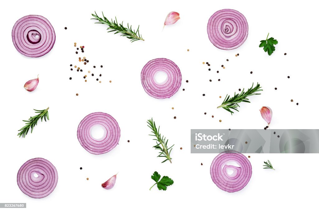 sliced red onion with spices and herbs sliced red onion with spices and herbs  isolated on white background. Top view Onion Stock Photo