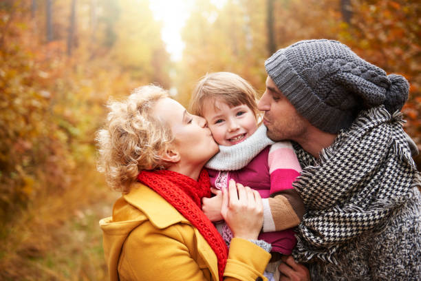 istock Big kiss for small girl 823280986