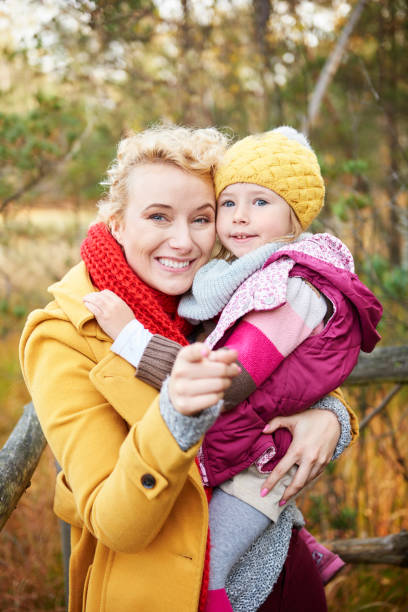 istock Close up of mummy and her daughter 823283642