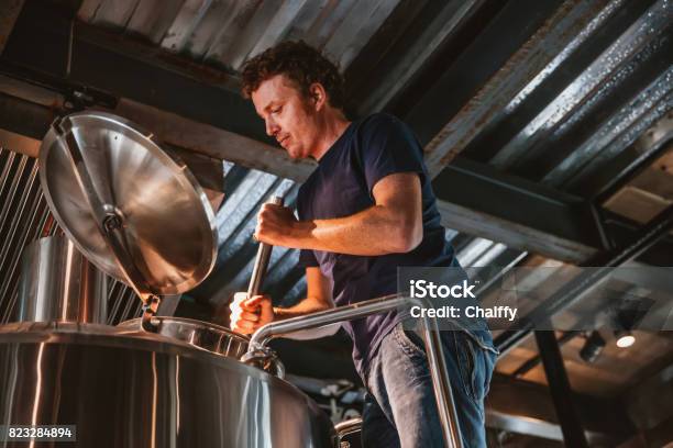 Man Brewing Beer Stock Photo - Download Image Now - Brewery, Beer - Alcohol, Craftsperson