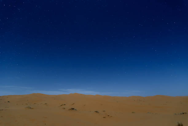 Stars at night over the dunes, Sahara Desert, Hassilabied, Morocco