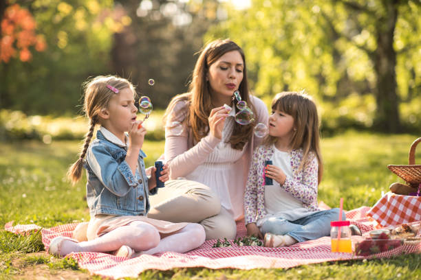 istock Having fun with bubble wand in the park! 823295822