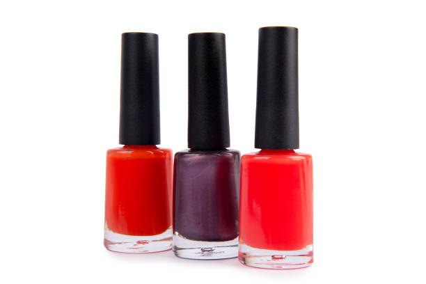 istock Three nail polish bottle isolated on white 823297226