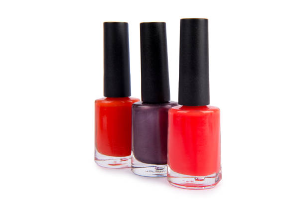 istock Three nail polish bottle isolated on white 823297234