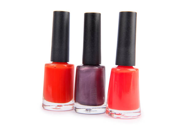 istock Three nail polish bottle isolated on white 823297242