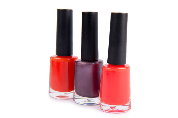 istock Three nail polish bottle isolated on white 823297252