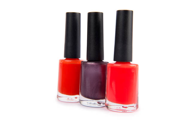 istock Three nail polish bottle isolated on white 823297262
