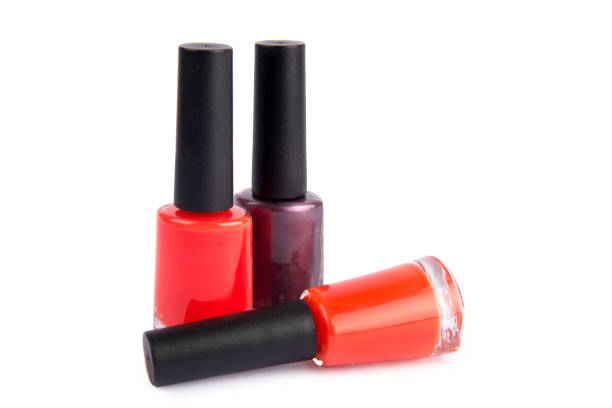 istock Three nail polish bottle isolated on white 823297272