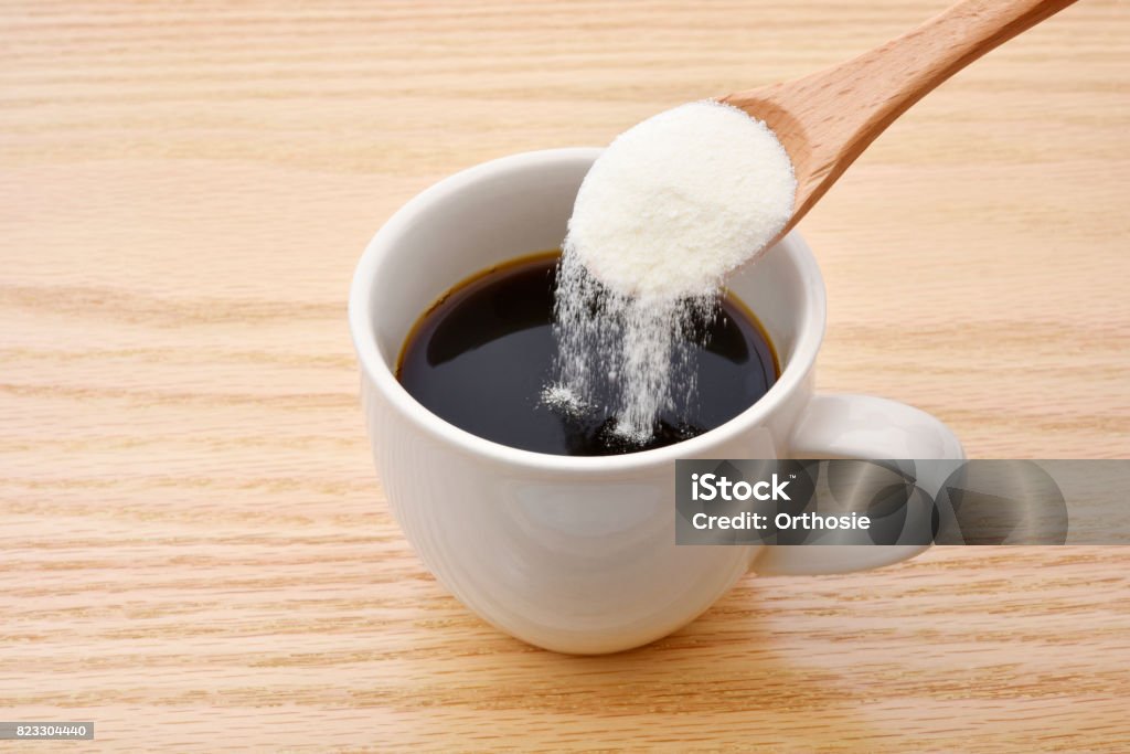 Coffee and collagen powder Place collagen powder in coffee Collagen Stock Photo