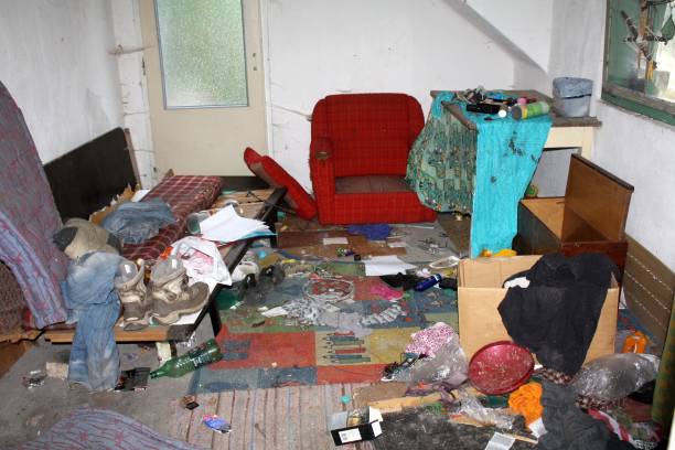 Real mess in forsaken unkempt old house Ceske Budejovice, Czech republic - August 3, 2015: Real mess in forsaken unkempt old house, where homeless people or squatters spending nights tramp home stock pictures, royalty-free photos & images