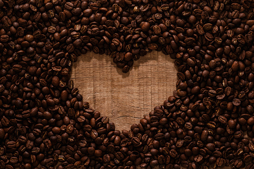 Coffee bean background with a space to fill in text