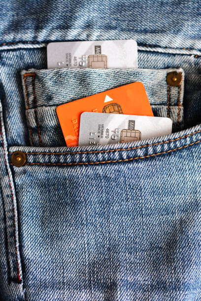 istock Colorful credit cards in blue jeans back pocket 823306844