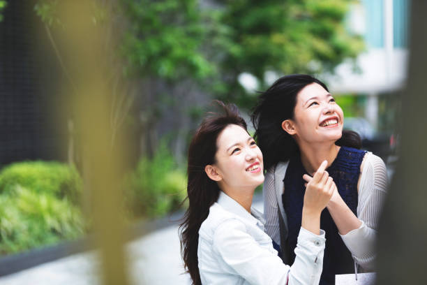 istock Friends facing a windy day as they spend quality time with each other. 823316038