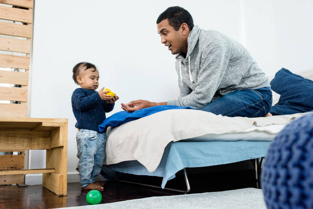 istock Father and baby boy having fun 823318336