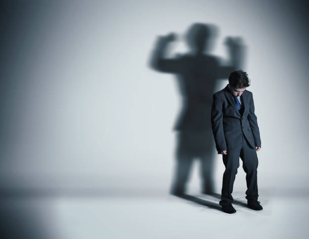 istock Image of a weak businessman standing depressed 823319294