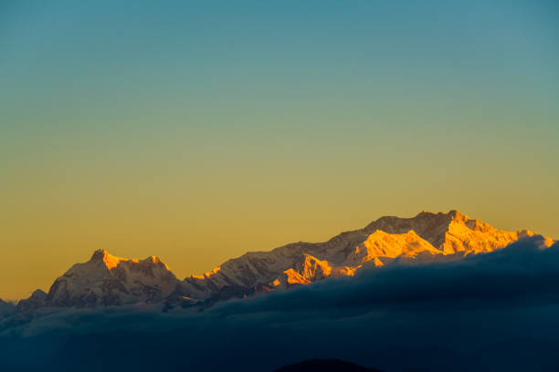Dramatic landscape Kangchenjunga mountain with colorful from sunlight at Sandakphu, north of India
