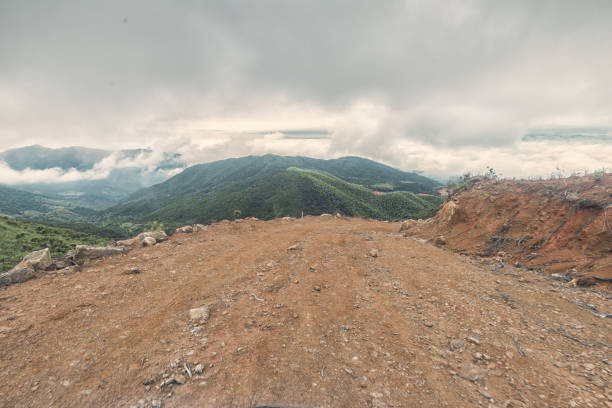 turn rock stone road in mist with tire imprint for automobile commercial,especiall cross country vehicle and sport utility vehicle,