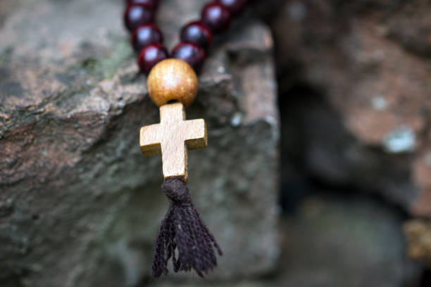 istock Wooden rosary with a cross 823327820