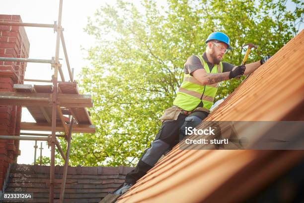 Roofer Replacing The Old Tiles Stock Photo - Download Image Now - Rooftop, Repairing, Roofer