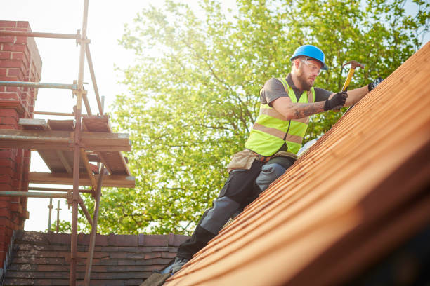 roofer replacing the old tiles - uk scaffolding construction building activity imagens e fotografias de stock