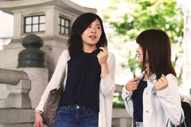istock Tourist friends walking around town. 823334700