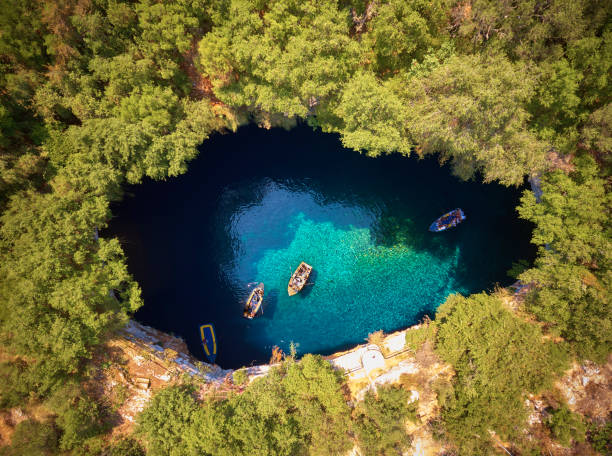 Melissani Cave - Kefalonia Aerial view of Melissani cave ( Melissani Lake ) in Kefalonia island, Greece mediterranean sea photos stock pictures, royalty-free photos & images
