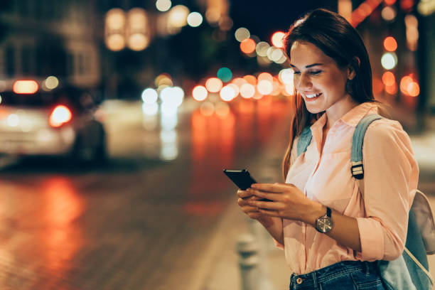 istock Woman texting in the city 823335566