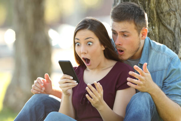 istock Surprised couple finding amazing content on line 823335770