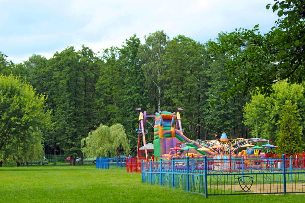 istock Children's carousel in the park 823336008