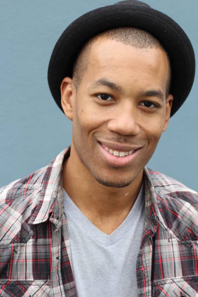 istock Striking man smiling close up 823339660