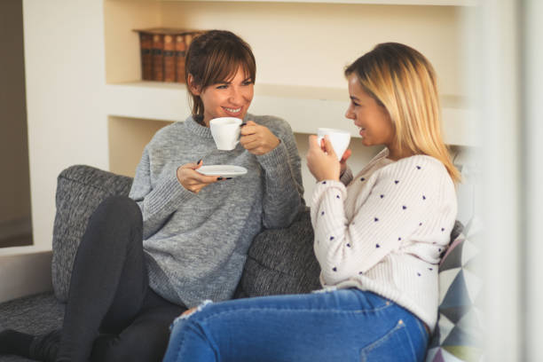 istock Two female friends enjoying coffee and small talk 823344778