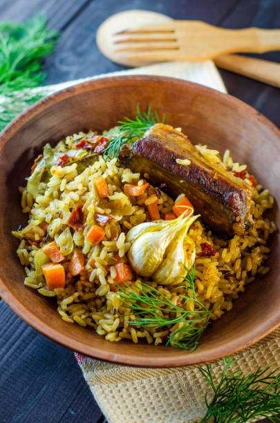 istock Pilaf on a platter with meat and spices 823349808