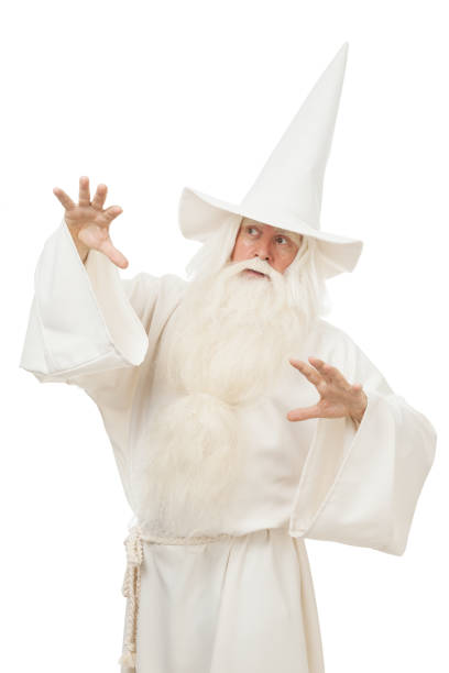istock Man in sorcerer costume on white background 823349826