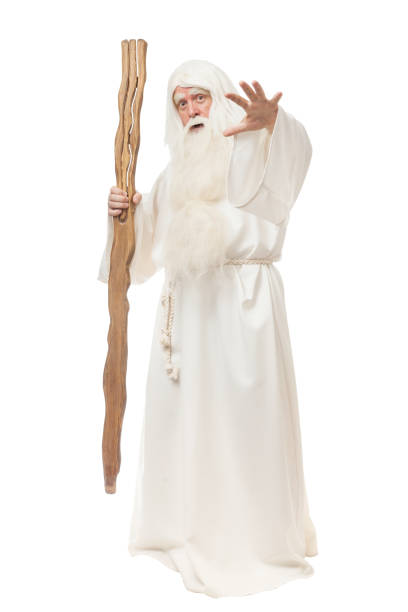 istock Man in sorcerer costume on white background 823350092