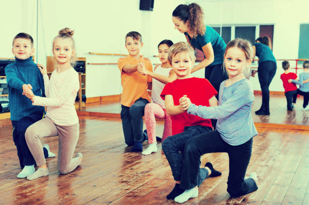 istock Children studying of partner dance  at dance school 823357792