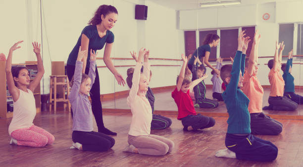istock Happy boys and girls studying contemp dance 823358910