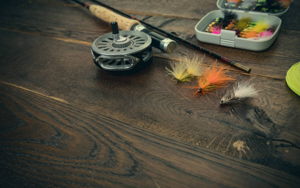 istock net, fishing rod, set by river 823375036