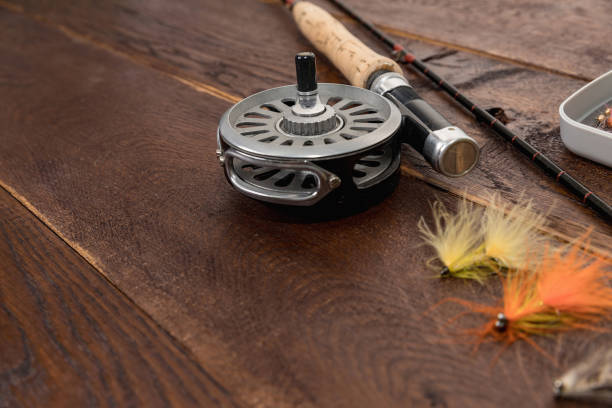 istock net, fishing rod, set by river 823375624