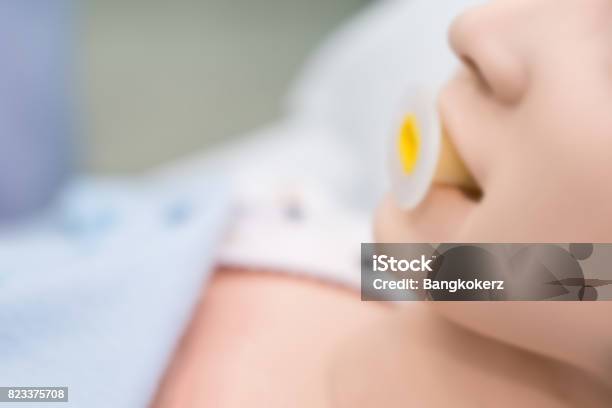 Blurry Background Of Dummy Patient On Oropharyngeal Airway To Open Her Airway Stock Photo - Download Image Now