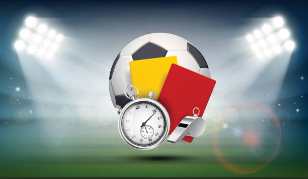 Soccer ball on the field of the stadium Soccer ball, whistle with a stopwatch, yellow and red card referee on the field of the stadium. Sports background illuminated by searchlights. Stock vector illustration. referee stock illustrations